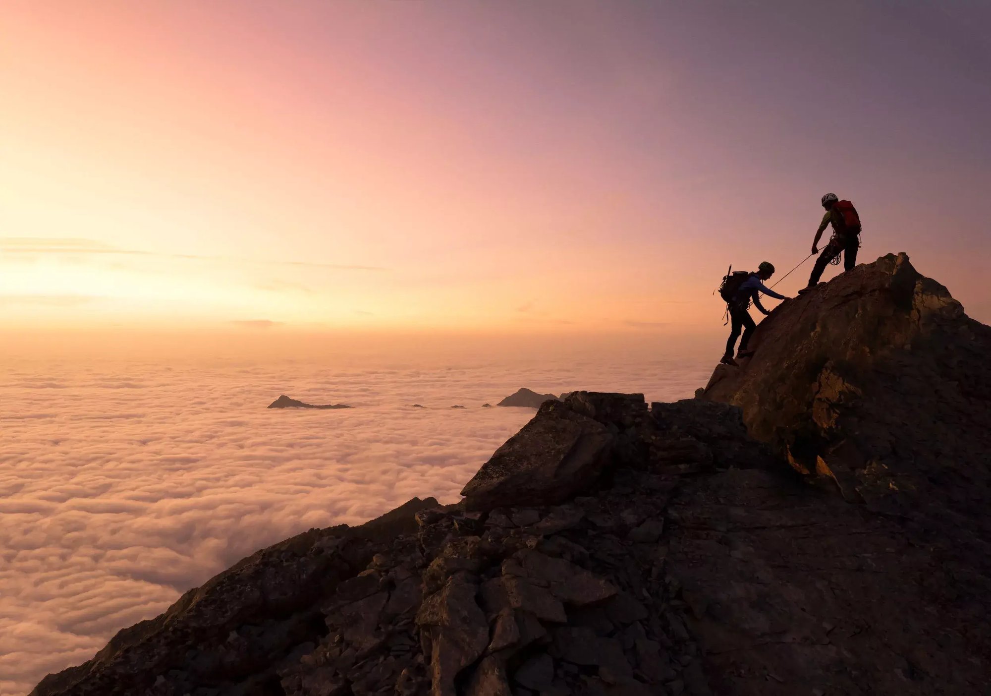 helping-each-other-climbing-mountain-GettyImages-860770930-2500-webp helping-each-other-climbing-mountain-GettyImages-860770930-2500-webp